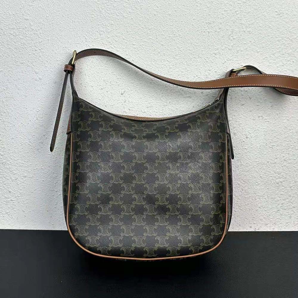 Side angle showing structured silhouette and calfskin detail of Celine Women Heloise Bag