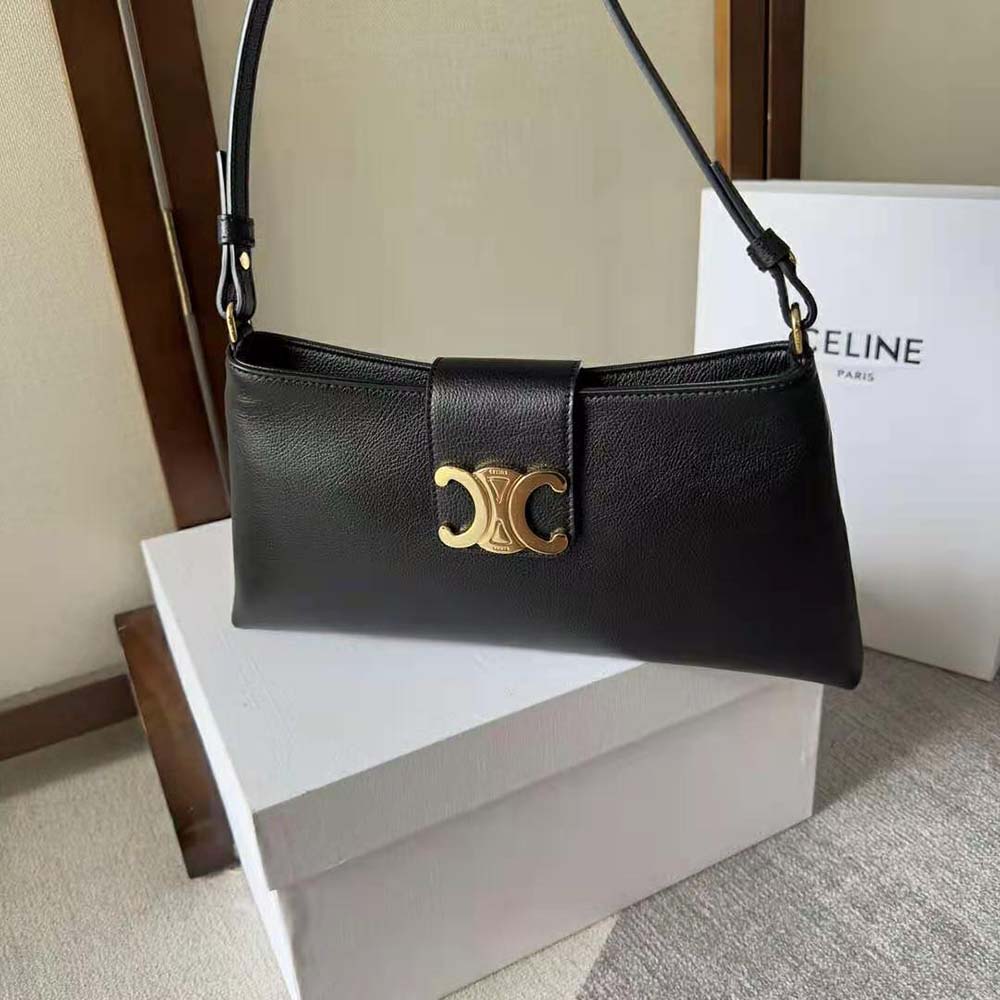 Close-up of gold-tone hardware on Celine Medium Wiltern Bag black leather