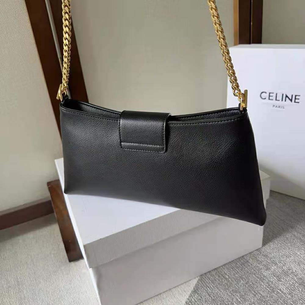Side profile showing structured silhouette of Celine Medium Wiltern Bag