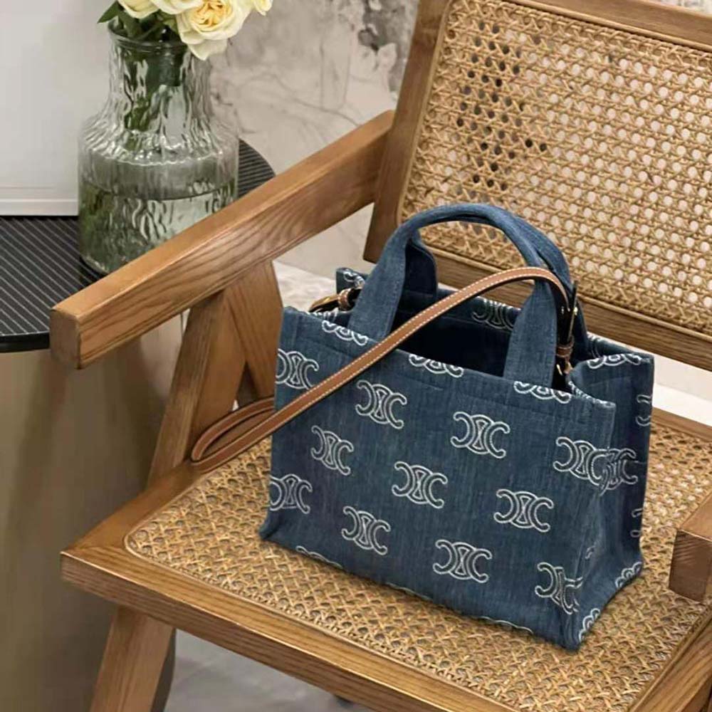 Side angle showing gold hardware on Celine Women Small Cabas Thais bag