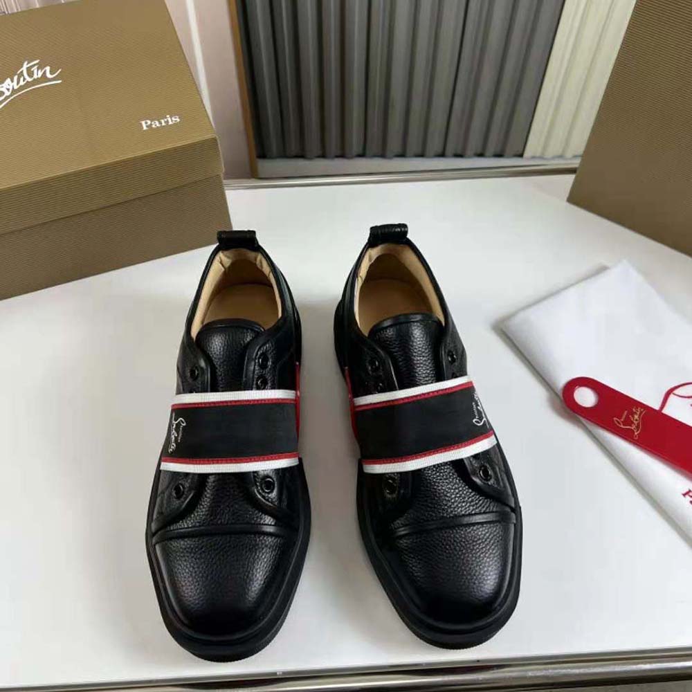 Close-up on black leather and laces of Christian Louboutin Men Adolescenza Sneakers-Black