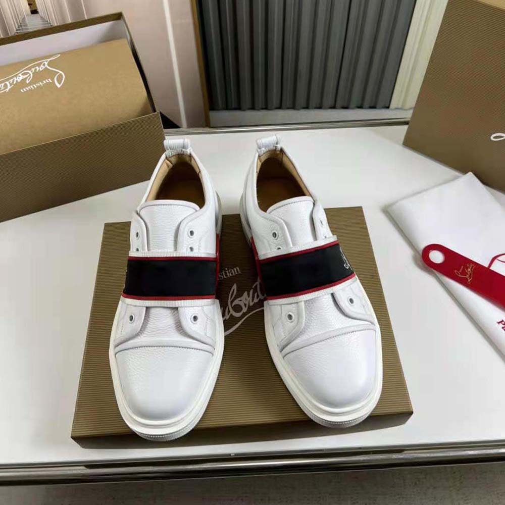 Close-up of white leather and laces on Christian Louboutin Men Adolescenza Sneakers-White