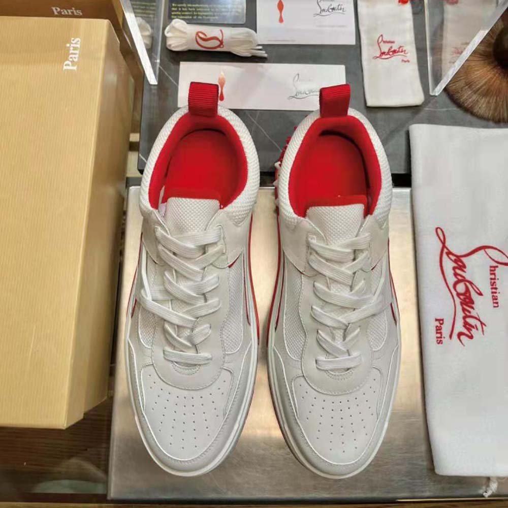 Close-up on red calf leather and signature sole of Astroloubi sneaker