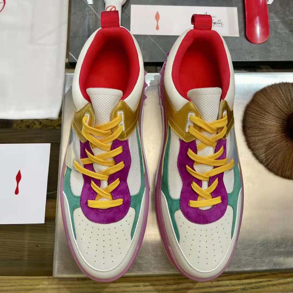 Close-up of purple calf leather and signature red sole on Astroloubi
