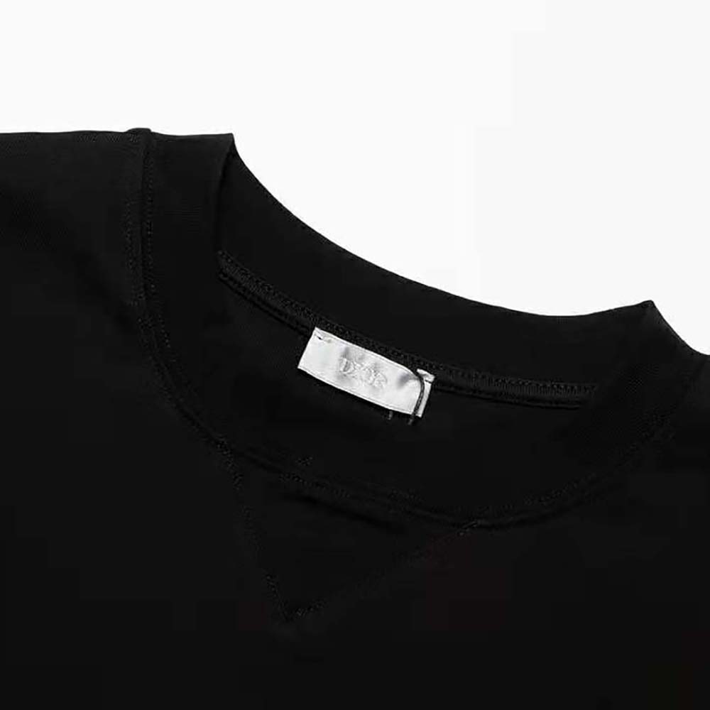 Side profile showcasing relaxed fit of Dior Men Christian Dior Couture T-shirt