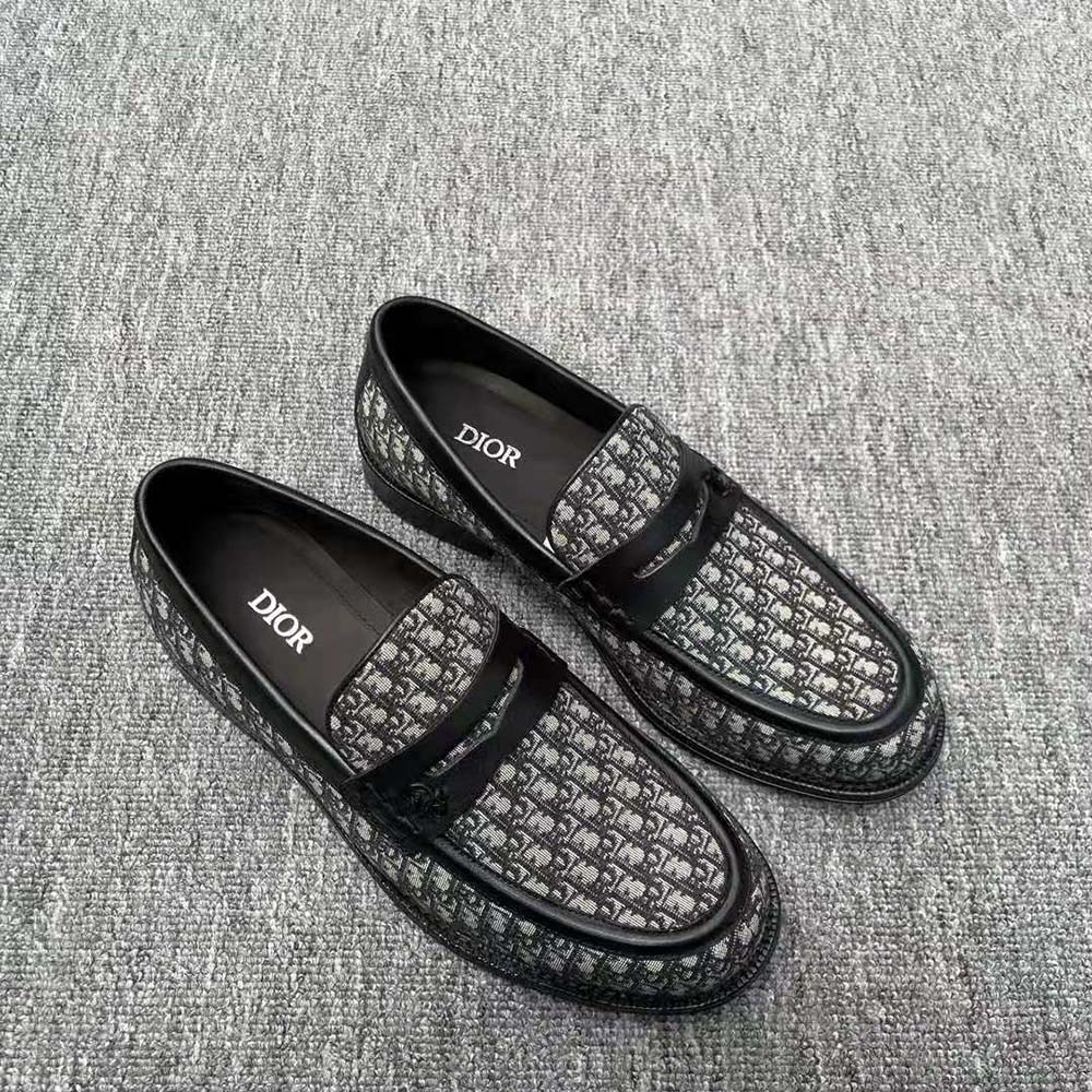 Close-up of silver hardware on Dior Men Granville Loafer Beige and Black Dior Oblique Jacquard
