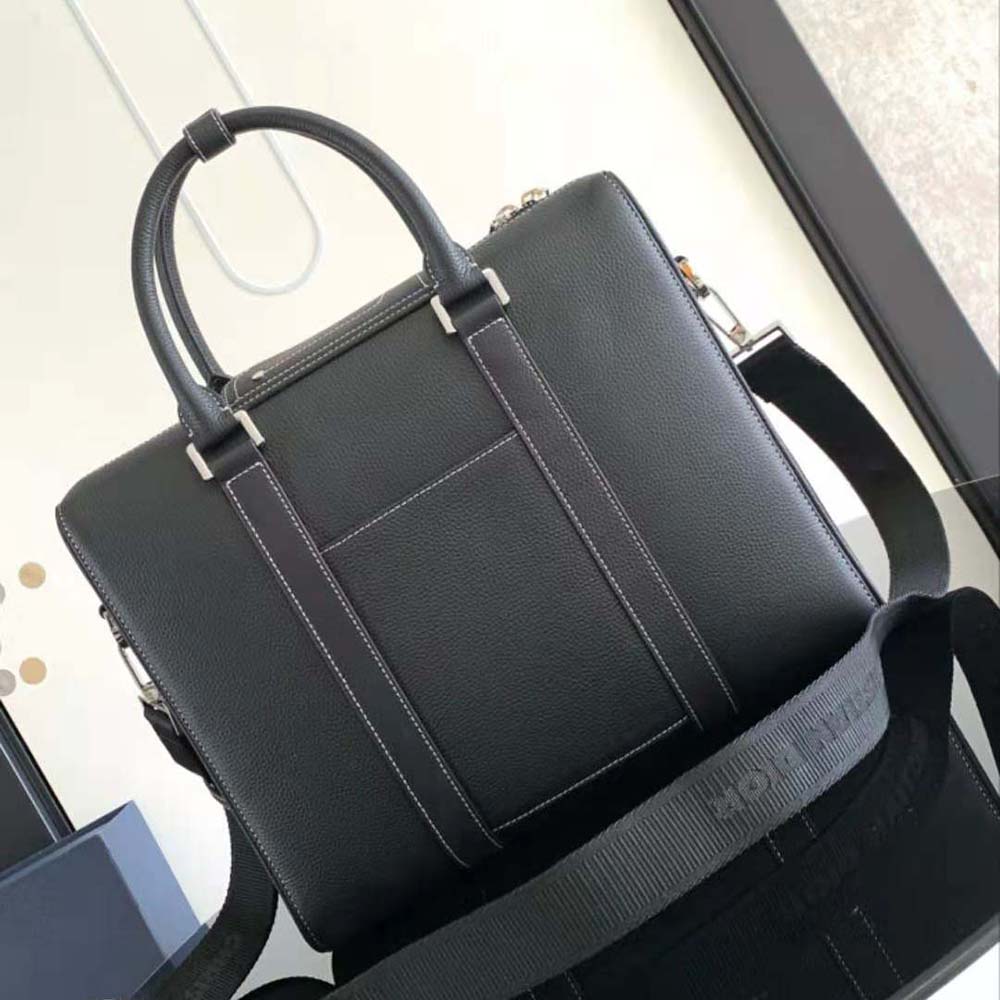 Side angle showing adjustable shoulder strap on Dior Men Lingot Briefcase black