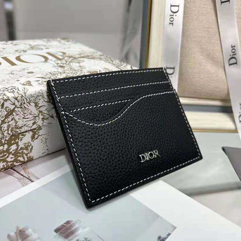 Side angle showing slim profile of Dior Men Saddle Card Holder