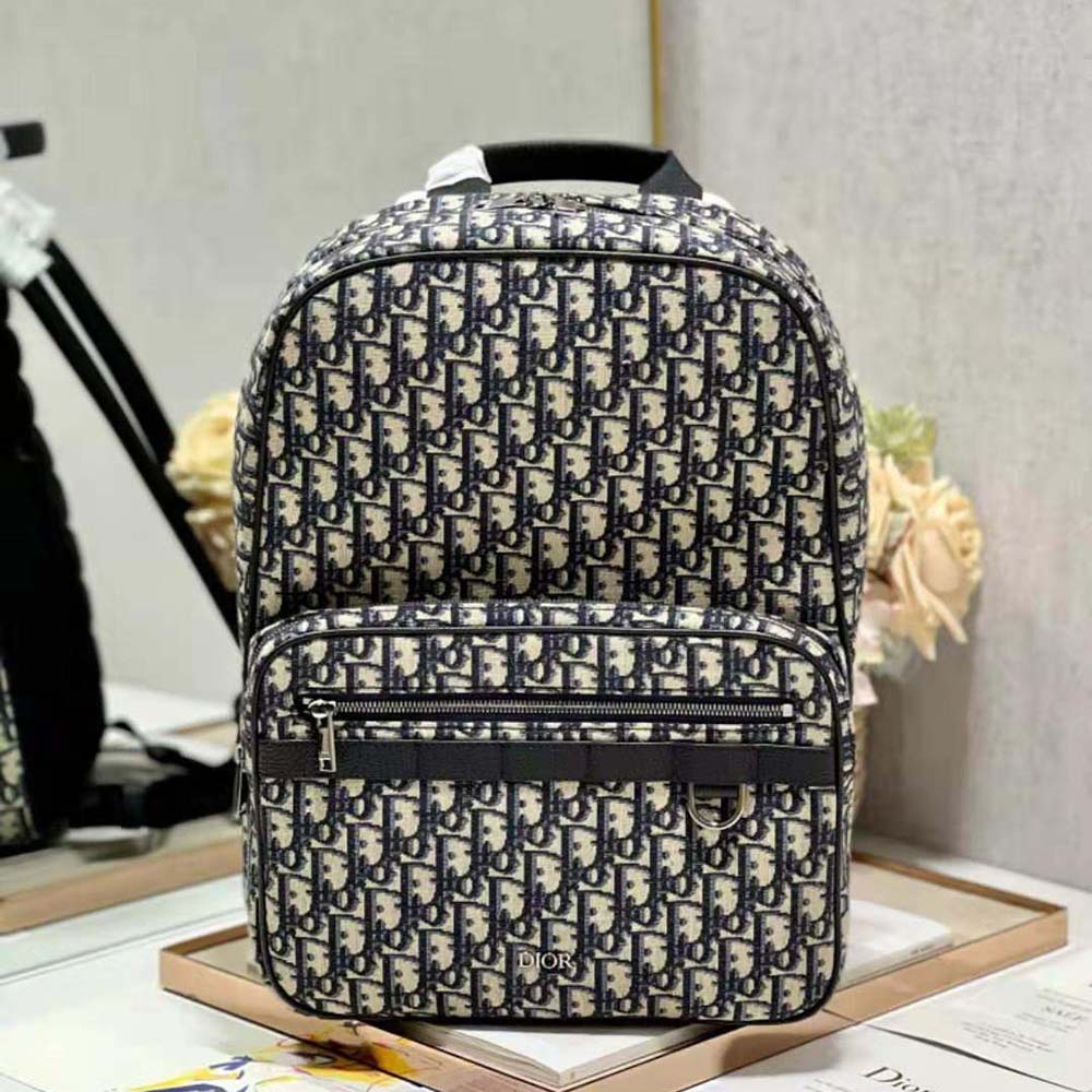 Close-up of black hardware and zipper on Dior Men Safari Backpack
