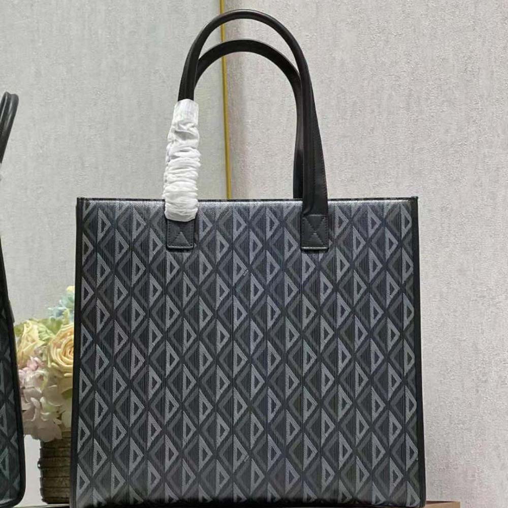 Side profile showing black leather trim on Dior Men Safari Tote Bag