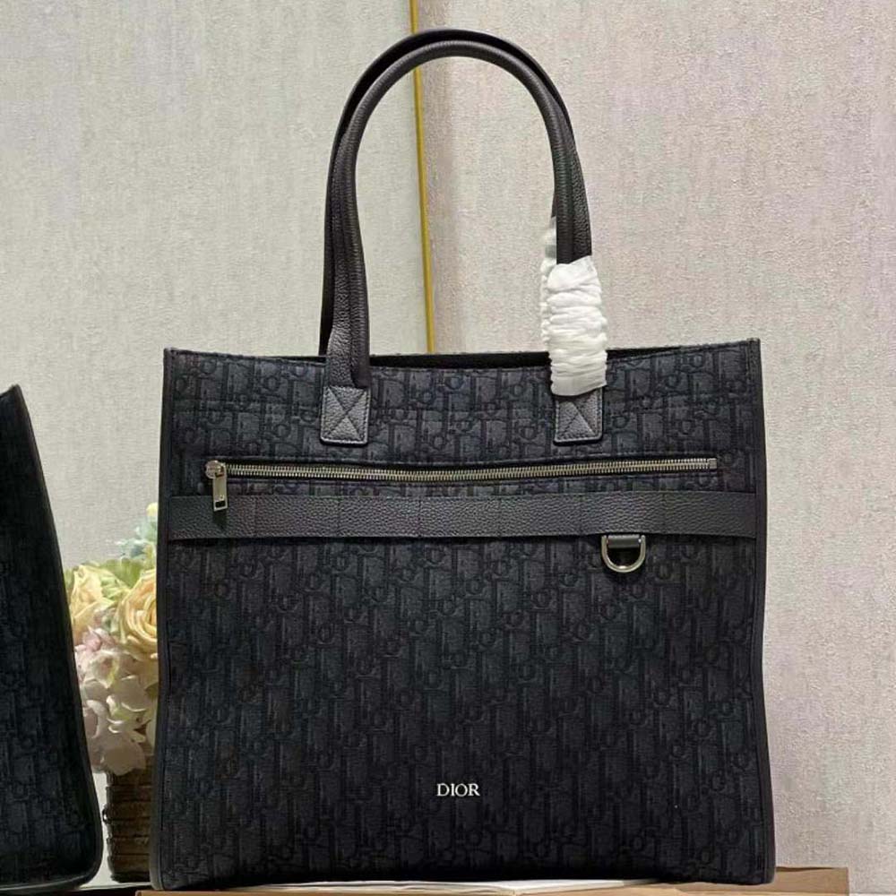 Close-up detail of silver-tone hardware on Dior Men Safari Tote Bag