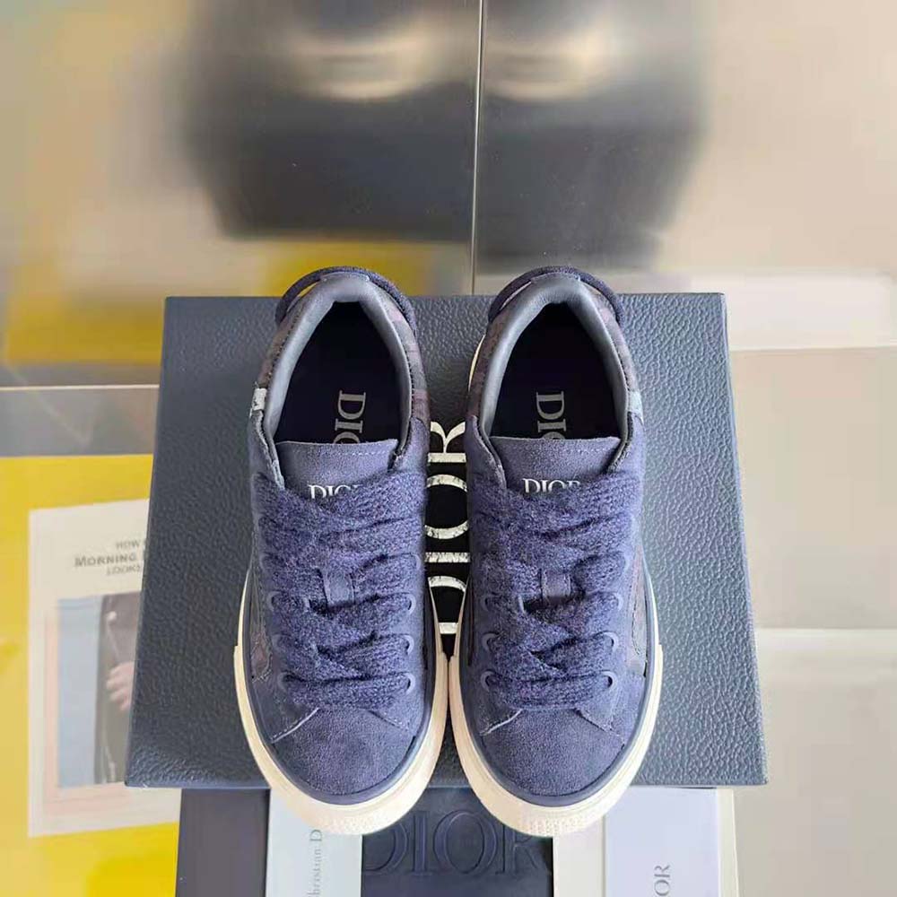 Overhead shot showing navy suede and blue lace-up on Dior Men Tears B33 Sneaker