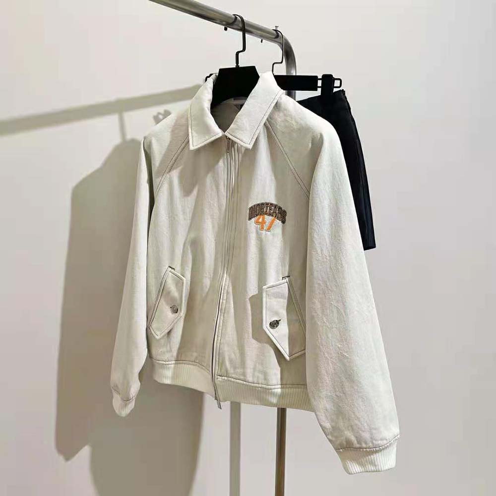 Close-up on signature zipper detail of Dior Men Tears Blouson