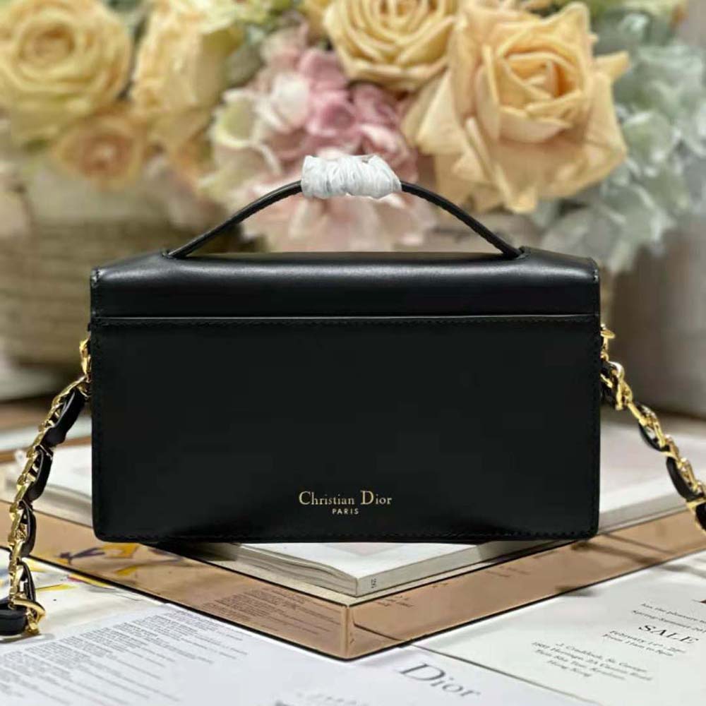 Side angle showing compact silhouette of Dior Women CD Signature Mini Bag