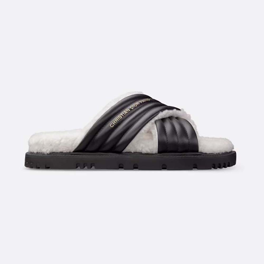 Side view of Dior Women D-Cross Slide Black Lambskin and White Shearling