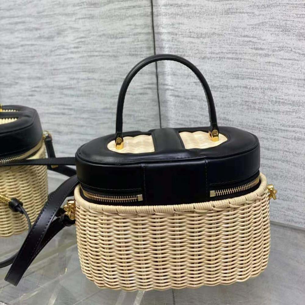 Close-up of gold-tone CD signature hardware on Dior Medium Vanity Case