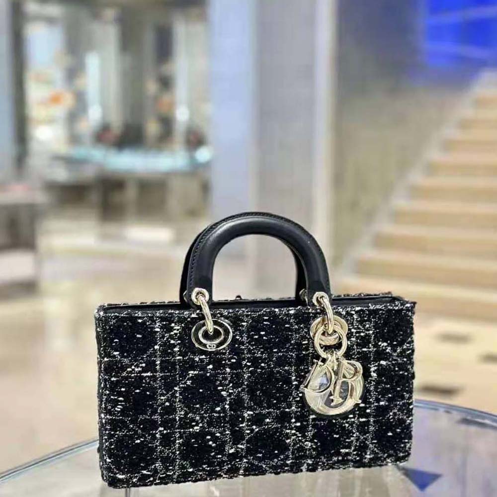 Close-up on Cannage tweed texture and Dior silver clasp detail