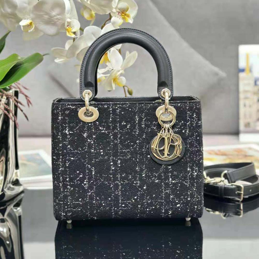 Side angle showing structured silhouette of Dior Women Medium Lady D-lite Bag