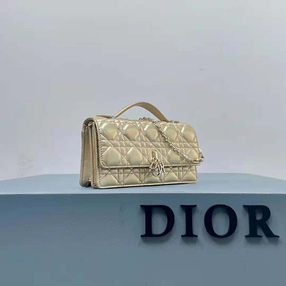 Close-up detail of gold-tone hardware on Dior Women Miss Dior Mini Bag