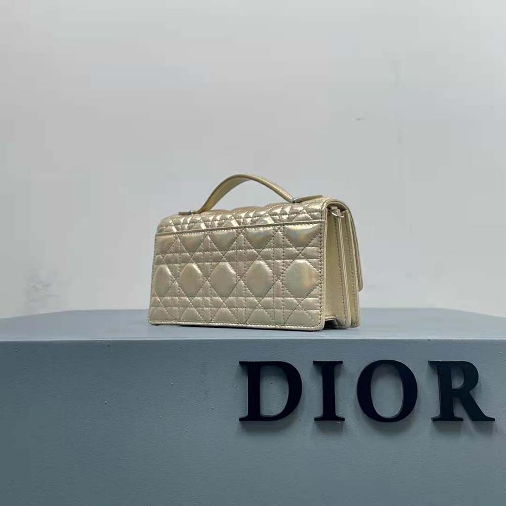 Side angle showing Cannage quilt texture on Dior Women Miss Dior Mini Bag