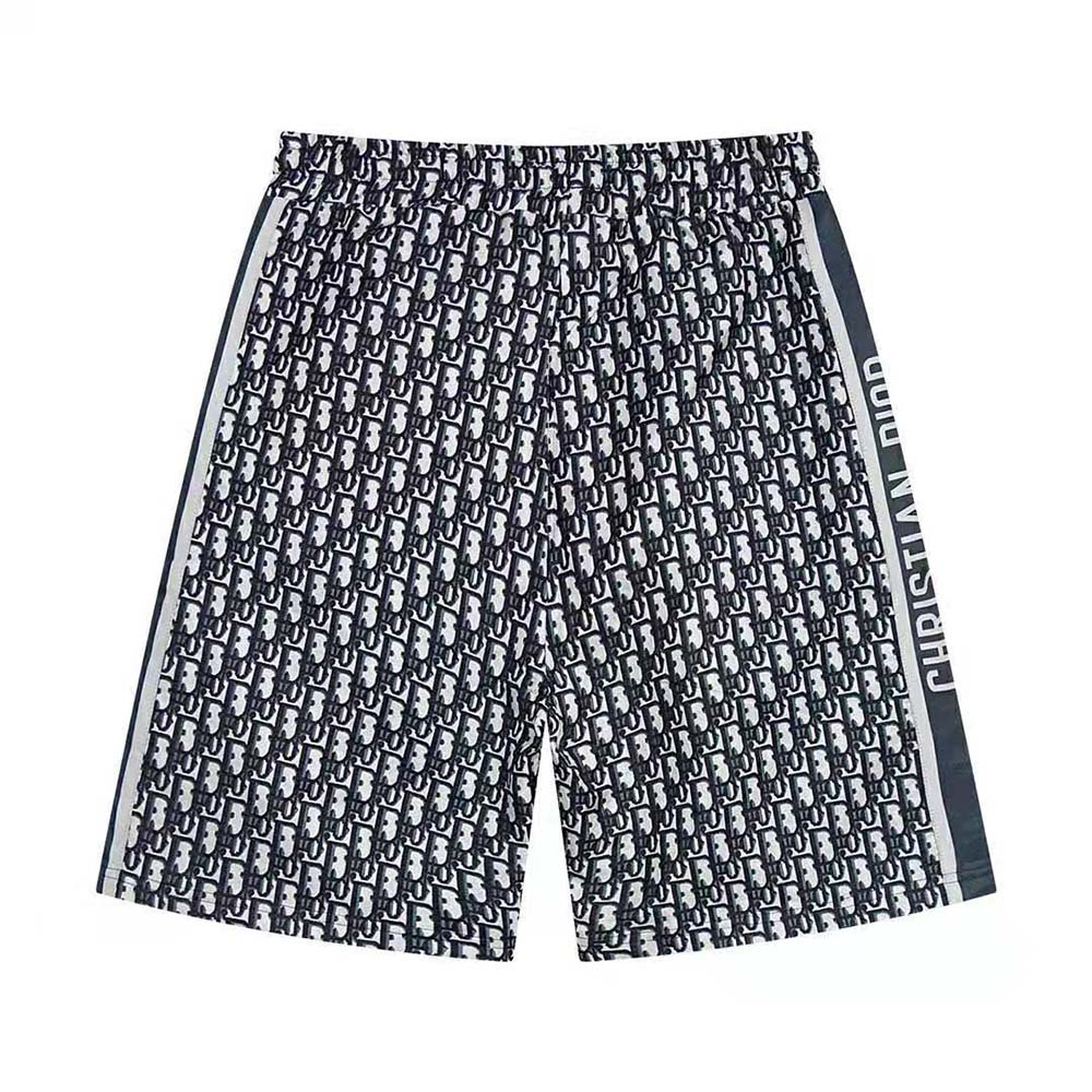 Close-up of Dior Men Oblique Bermuda Shorts Blue Silk Twill embossed Oblique detail