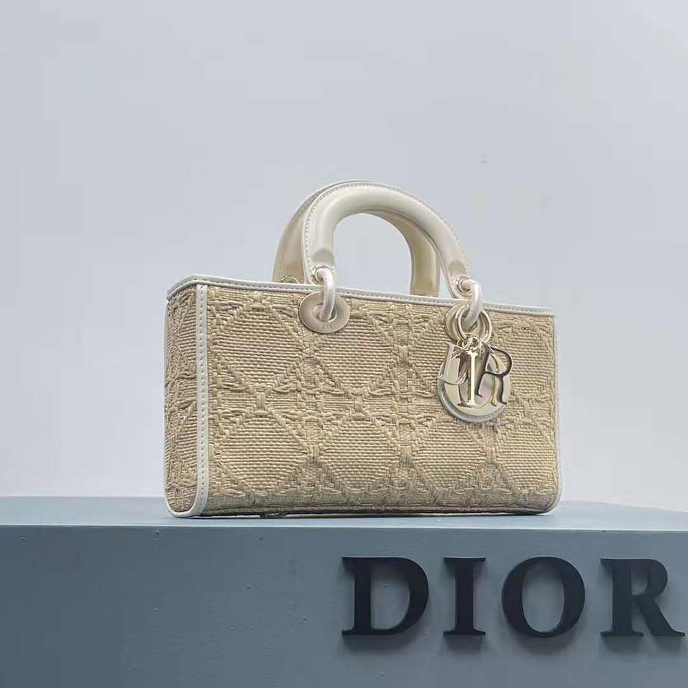 Side angle showing compact silhouette of Dior Women Small Lady D-joy Bag