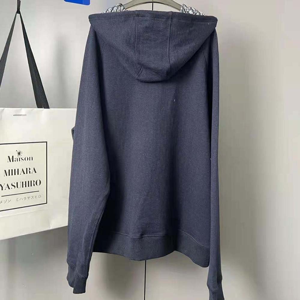 Side angle showcasing knit texture of Dior Women Track Jacket in navy