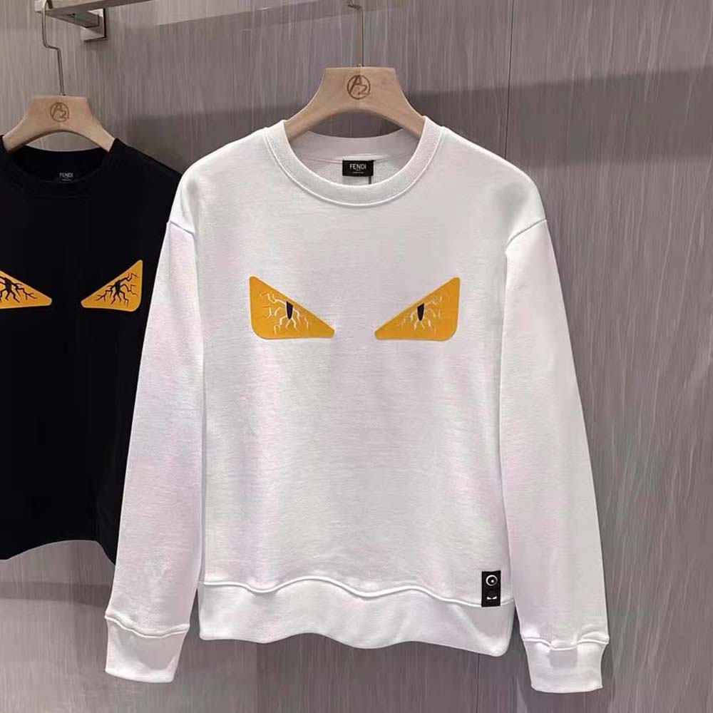 Close-up detail of Fendi logo embroidery on sweater sleeve