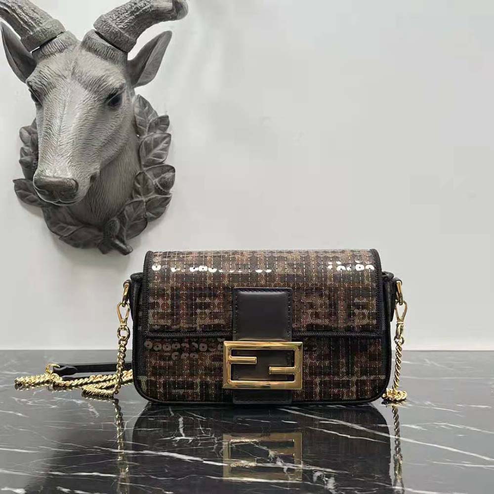 Close-up of gold hardware and sequins on Fendi Women Baguette Mini Bag