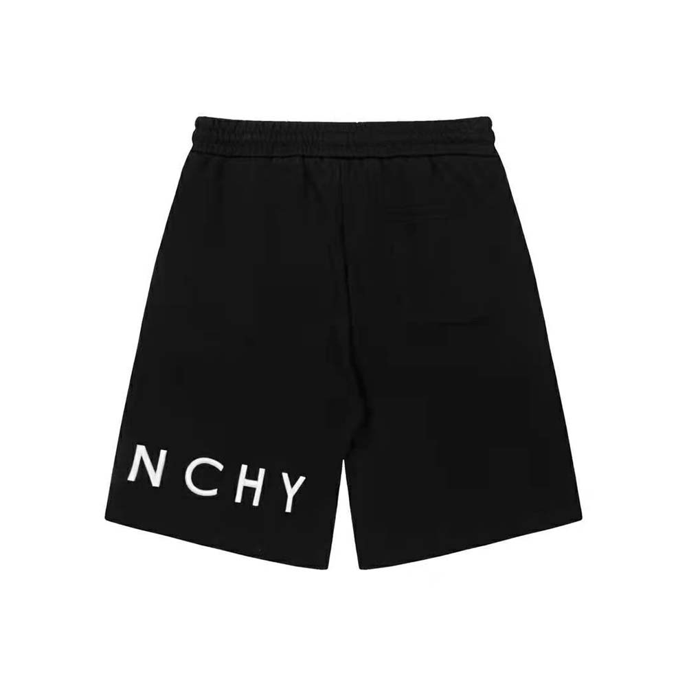 Side angle showing relaxed fit of Givenchy Men Archetype Bermuda Shorts