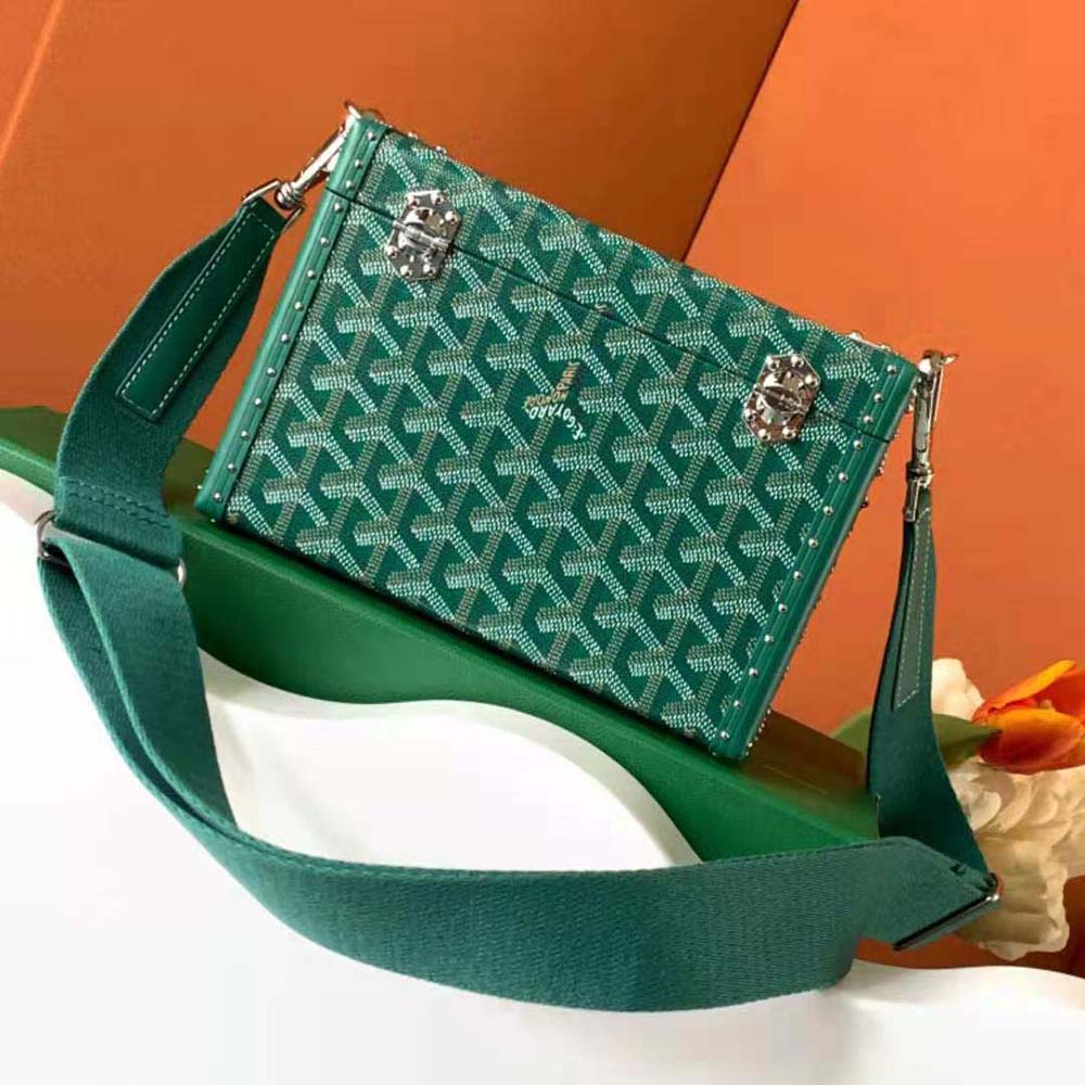 Side angle showing Clamecy cowhide trim on Goyard Women Cassette Trunk Bag