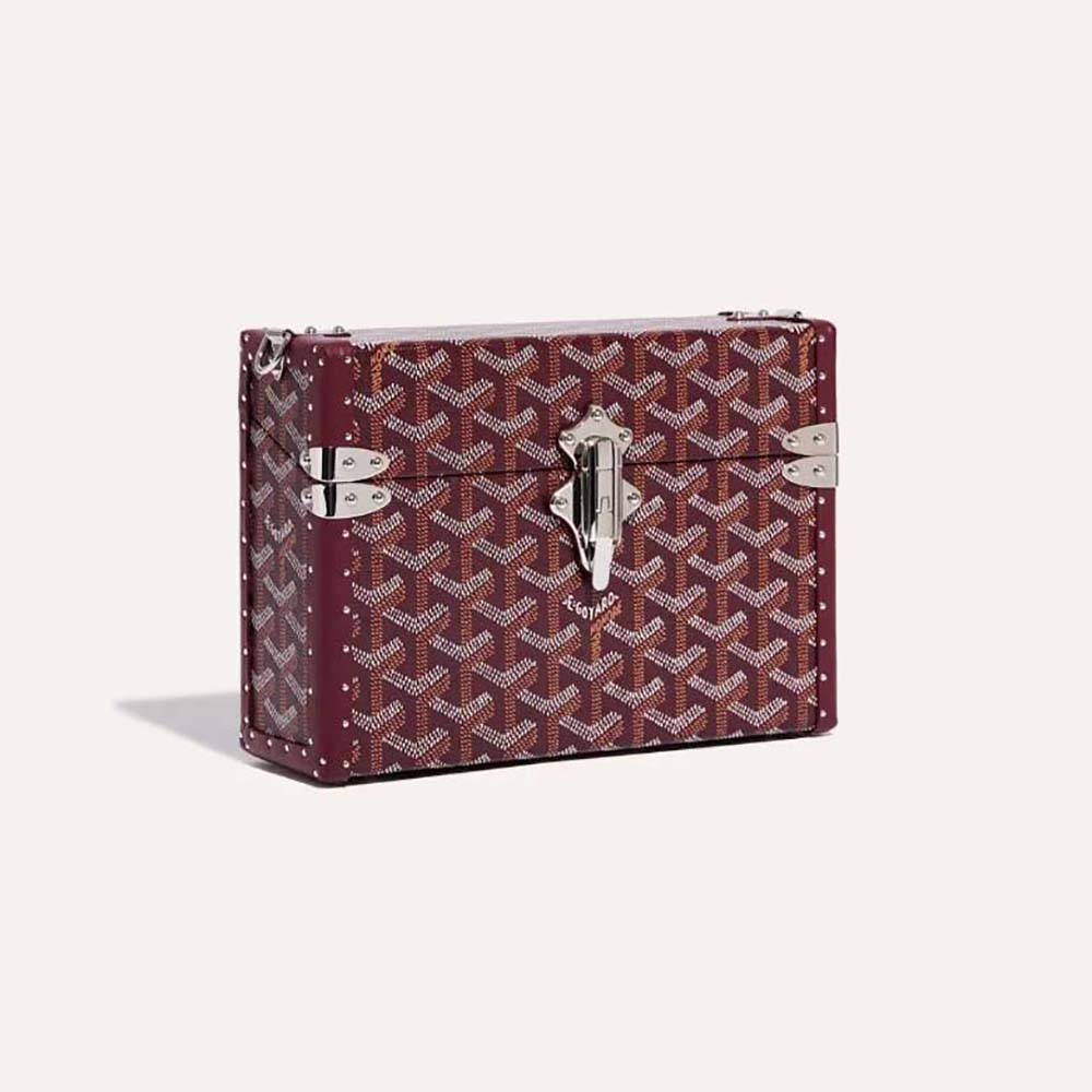 Front angle of Goyard Women Cassette Trunk Bag in maroon canvas