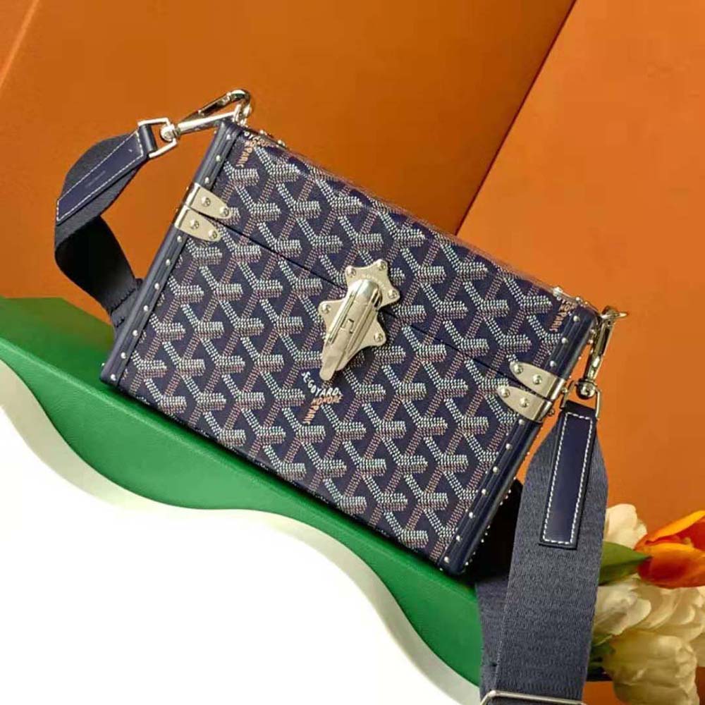 Close-up of Goyardine canvas and Clamecy cowhide on the Goyard Women Cassette Trunk Bag