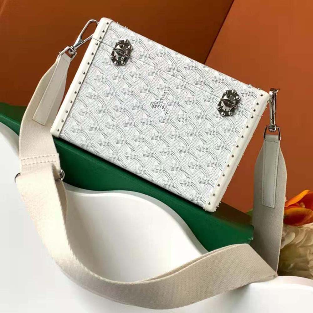 Side view highlighting compact silhouette of Goyard Women Cassette Trunk Bag