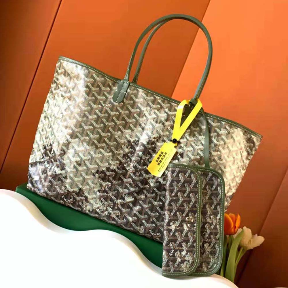 Close-up of green Goyardine canvas and leather trim details