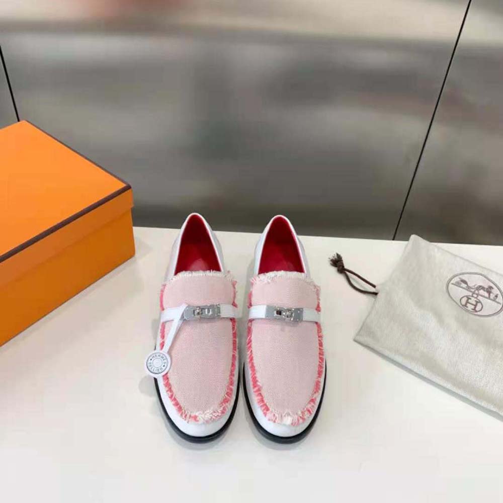 Close-up on signature silver hardware of Hermes Women Destin Loafer