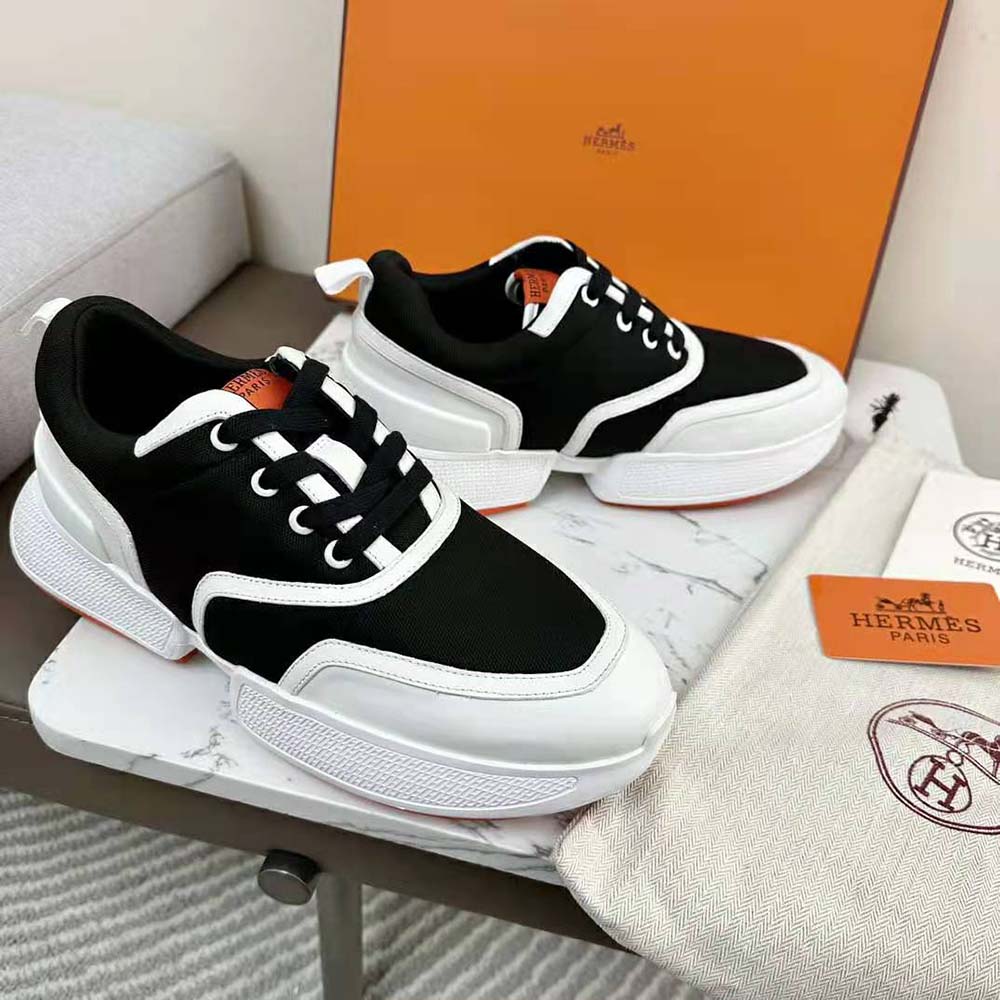 Top view showing laces and silhouette of Hermes Women Giga Sneaker Black