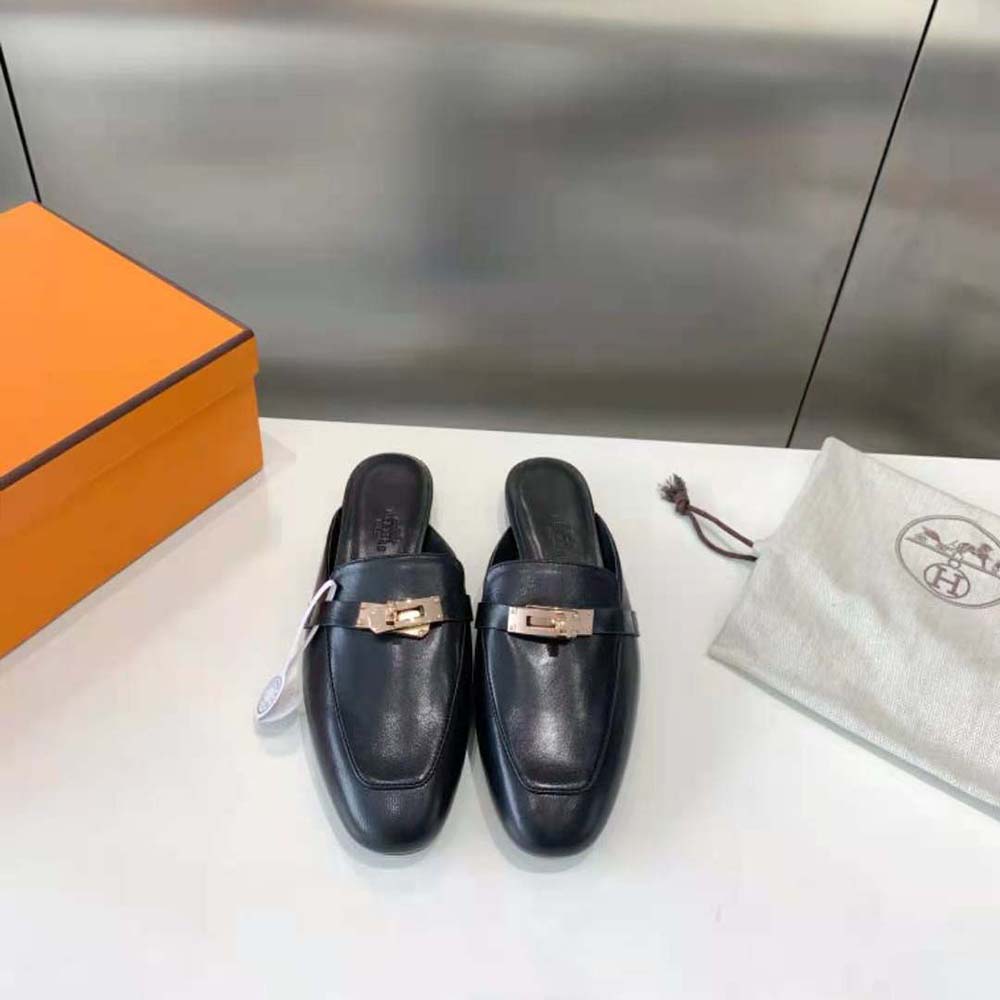 Close-up of Hermes Women OZ Mule gold-tone hardware detail