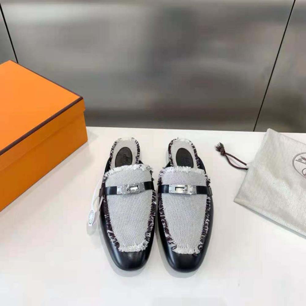 Close-up of black calfskin leather and embossed Hermes detail