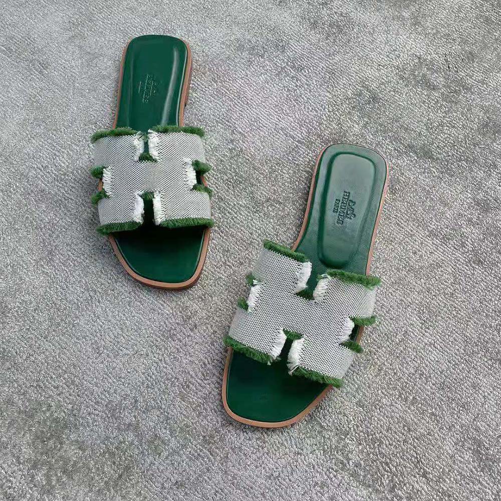 Top view showing leather insole and open toe Hermes Oran Sandal green