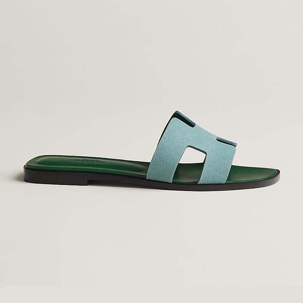 Side profile of Hermes Women Oran Sandal in Suede Goatskin-Blue