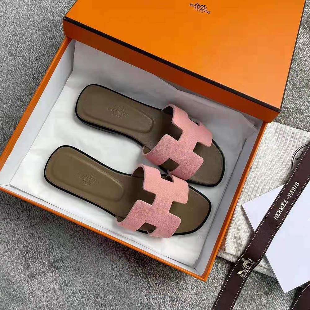 Close-up of H cutout on Hermes Women Oran Sandal suede upper