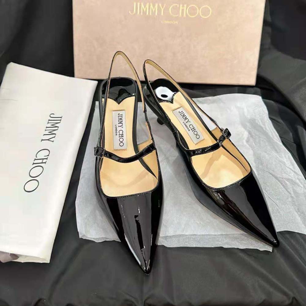 Close-up of pointed toe and glossy patent leather on Didi 45 pumps
