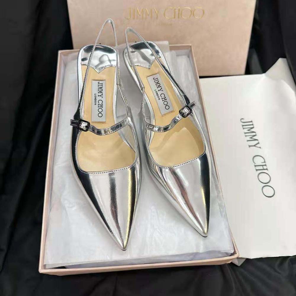 Close-up of pointed toe and silver liquid metal leather texture on Jimmy Choo Women Didi 45