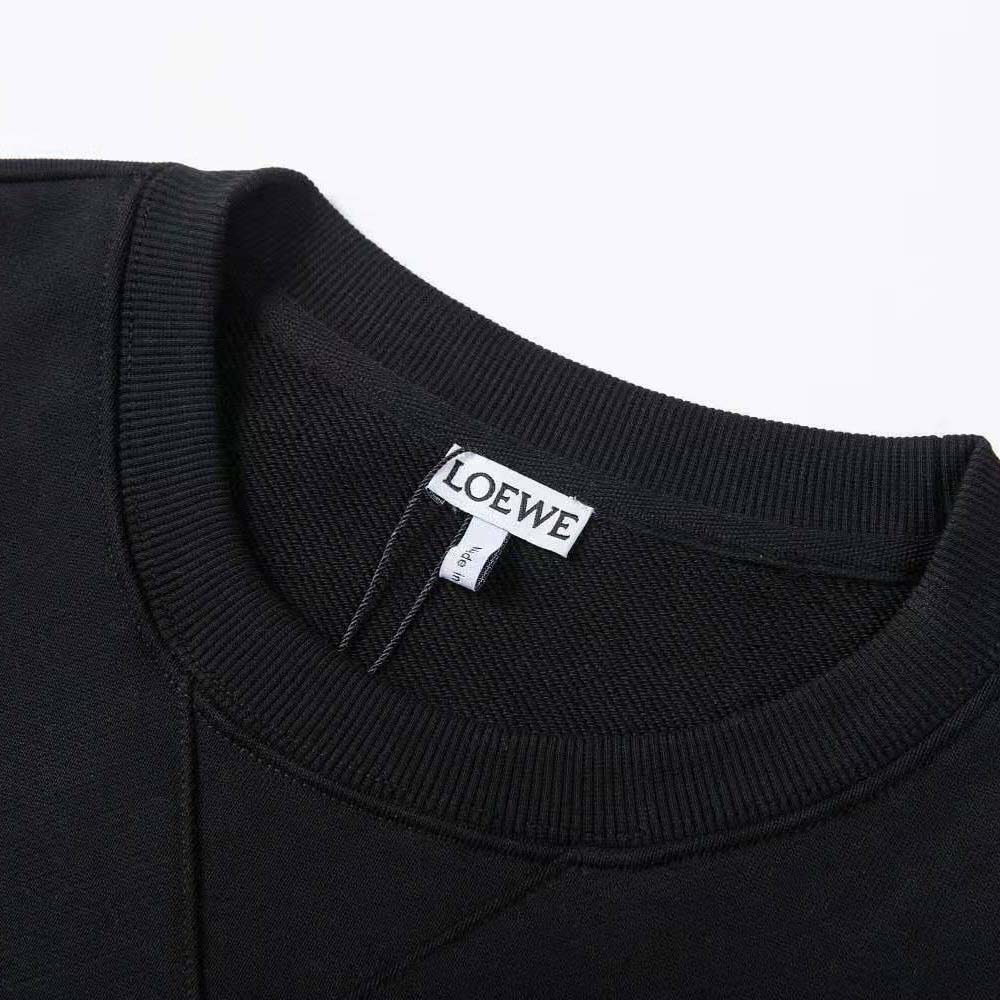 Side angle showing fit and ribbed cuffs of Loewe Men Anagram Sweatshirt