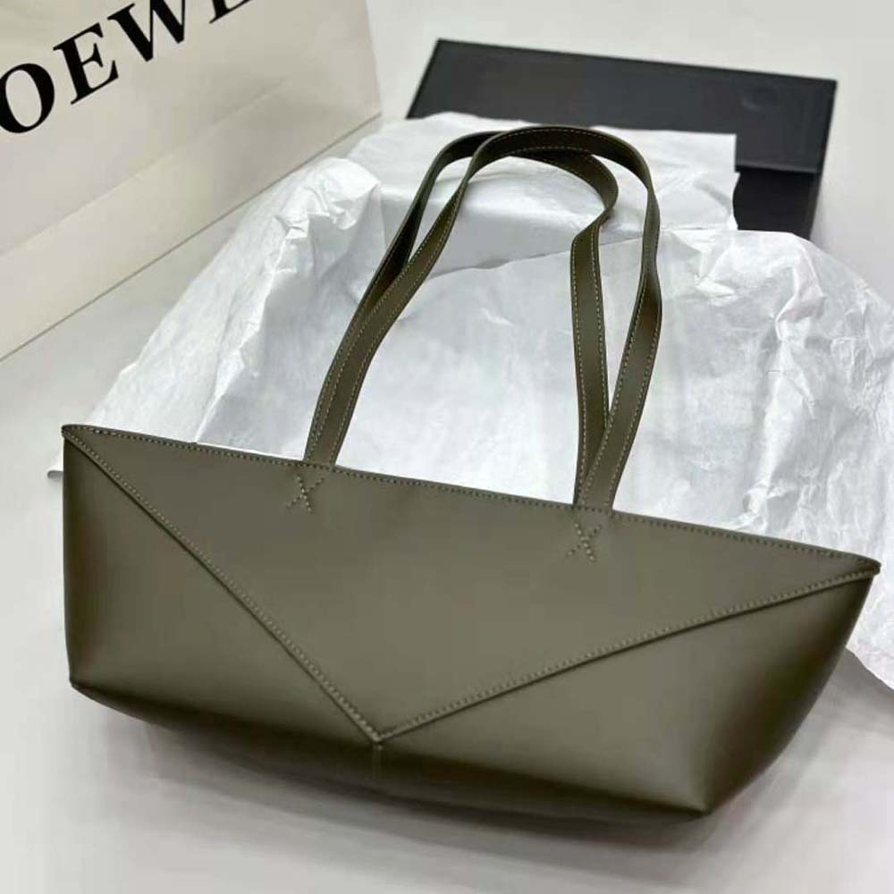 Close-up of silver hardware and leather texture on Loewe Cropped Puzzle Fold Bag