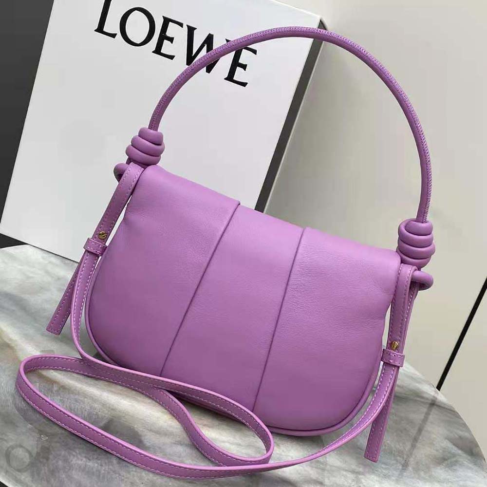 Side angle showing silhouette and strap of Loewe Women Paseo Satchel purple leather