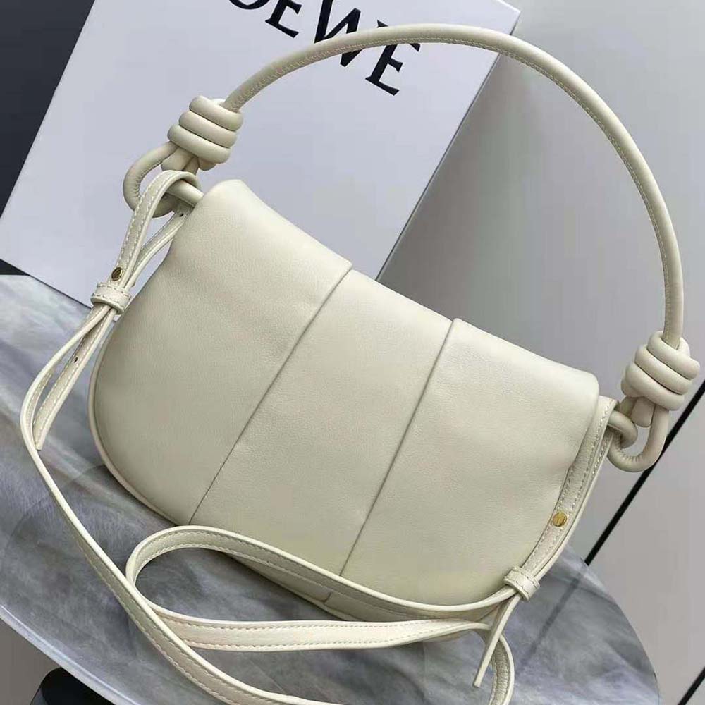 Side angle showing silhouette and strap of Loewe Women Paseo Satchel white