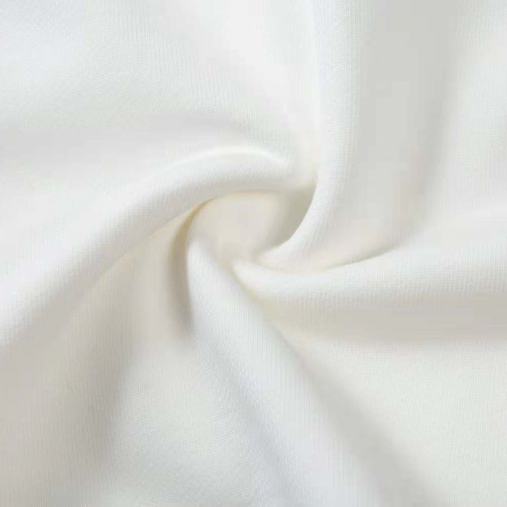 Side angle showing relaxed fit and soft fabric texture hoodie