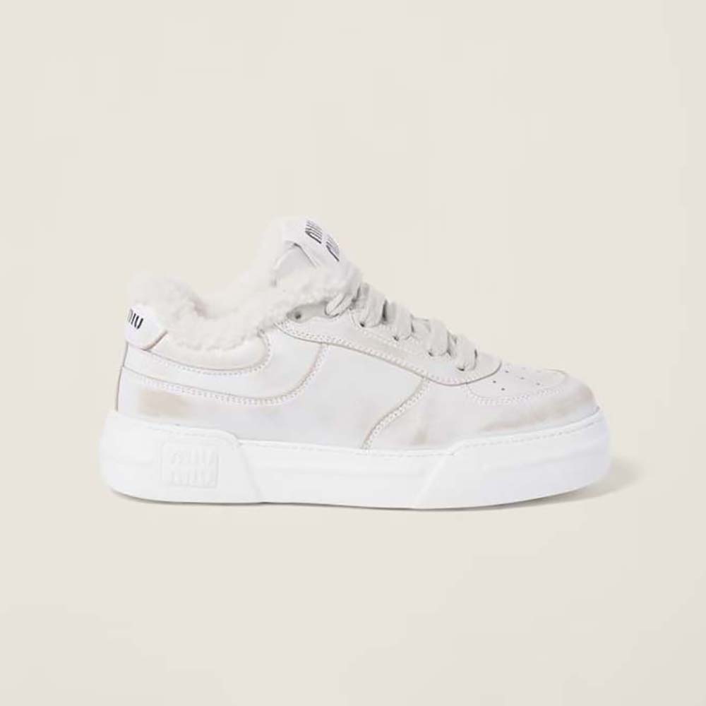 Side profile of Miu Miu Women Bleached Leather Sneakers in EVA Sole with Logo